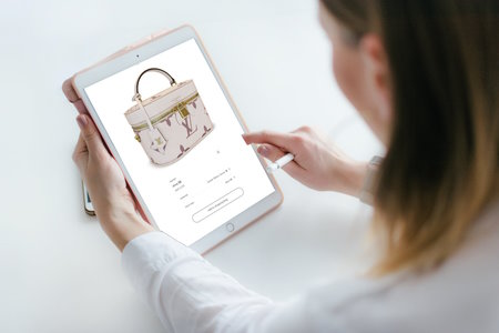 woman viewing product using online 3D viewer